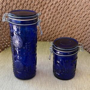 Set of 2 Vintage Cobalt Blue Embossed Wire Bail Glass Jars. Very Good Condition.